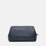 Athens toilet bag in navy full-grain leather, zipped shut, seen from the front