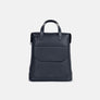 Austin convertible bag in navy full-grain leather, seen from the front with its top handles