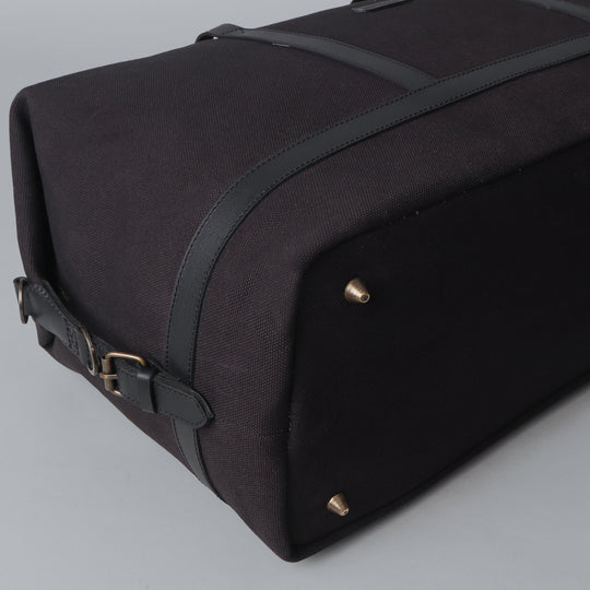 black canvas travel handbag