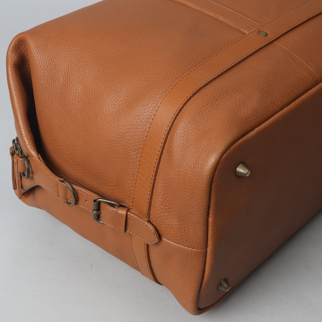 Tan leather travel bag for boys