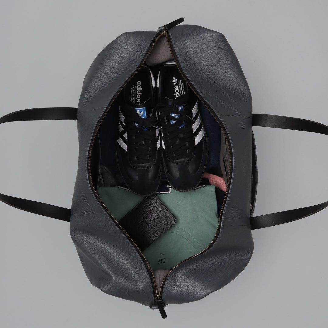 grey leather travel bag