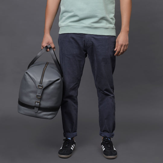 grey leather travel handbag