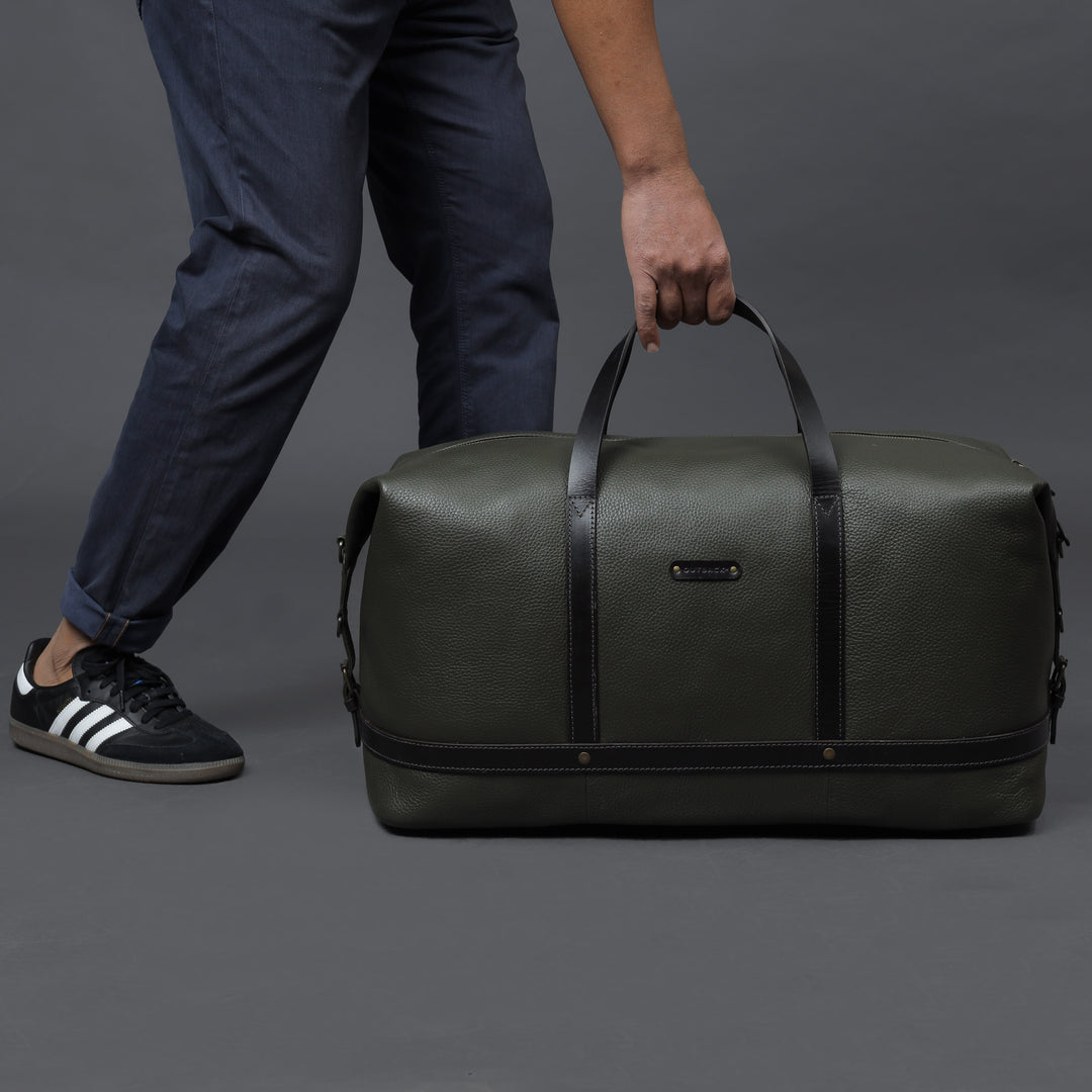 green leather travel hand bag